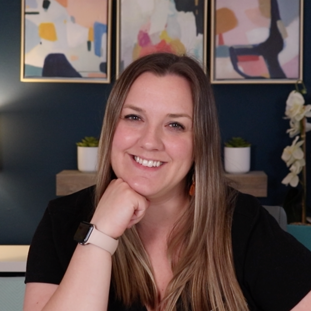 Ally Figiel smiling in professional headshot – Madison WI real estate agent